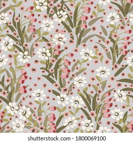 Endless magic flower garden seamless vector pattern. A meadow of flowers in a palette of peach, green and red on grey background.  Great for home decor, fabric, wallpaper, stationery, design projects.