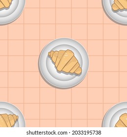 an endless pattern with a croissant on a plate on a checkered tablecloth