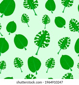 endless pattern of leaves of different sizes. seamless foliage green color