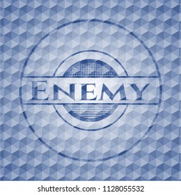 Enemy blue emblem or badge with abstract geometric pattern background.