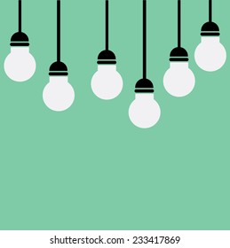 energy saving bulbs on Green background 