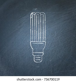 Energy saving fluorescent light bulb icon sketch on chalkboard. Economical lamp symbol in line style - chalk drawing on blackboard.