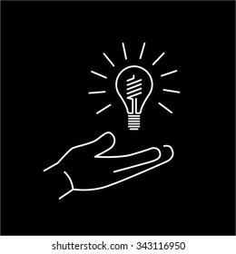 Energy saving light bulb in hand ecology and environment vector icon and infographic white on black background
