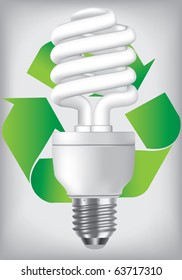 Energy saving light bulb over the recycle sign