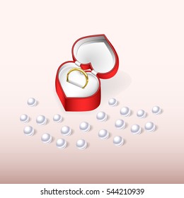 Engagement ring in a red box and pearls. Valentine's Day.