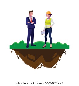 engineer with female builder on the lawn