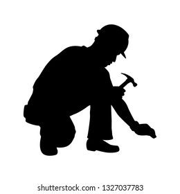 Engineer hits the nail with hammer silhouette vector, people on white background