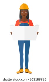 Engineer holding a blueprint.