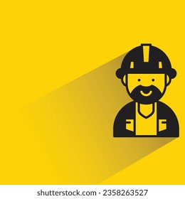 engineer with shadow on yellow background