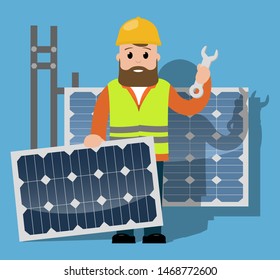 An engineer stands holding a solar panel and a spanner.