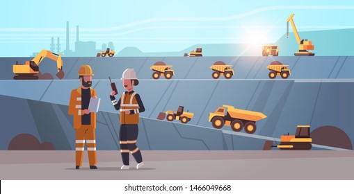 engineers using radio and tablet workers controlling professional equipment. working on coal mine extraction industry, mining transport concept, opencast stone quarry background flat horizontal.