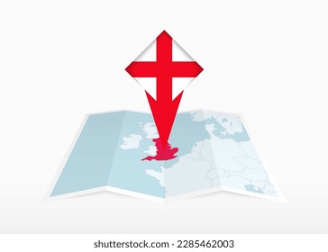 England is depicted on a folded paper map and pinned location marker with flag of England. Folded vector map.