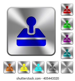 Engraved joystick icons on rounded square steel buttons