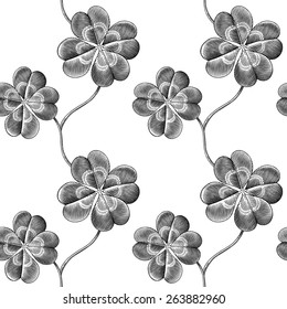 Engraved seamless pattern with four leaf clover
