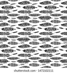 Engraving with black feathers isolated on a white background. Seamless texture.