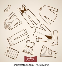 Engraving vintage hand drawn vector children clothes collection. Pencil Sketch belongings and accessories illustration.