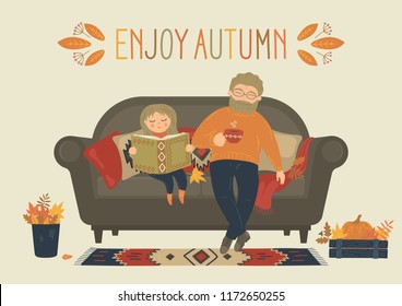 Enjoy Autumn. Father with daughter read book and drink tea or coffee on sofa at home. Cozy home. Family concept. Autumn decor. Original vector illustration.