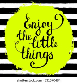 Enjoy the little things! Hand lettering calligraphic inspiration quote on a watercolor background. Creative, trendy card