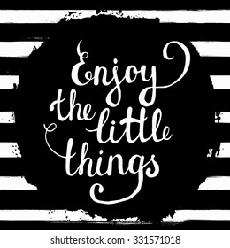 Enjoy the little things! Hand lettering calligraphic inspiration quote on a watercolor background. Creative, trendy card