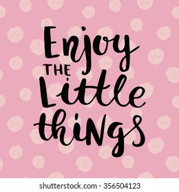 Enjoy the little things. Modern brush calligraphy on pattern of the circle. Handwritten ink lettering.