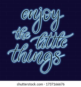 Enjoy the little things Neon sign with motivational quote lettering on dark background vector illustration. Logo design template. Light banner, glowing neon signboard for advertising. 