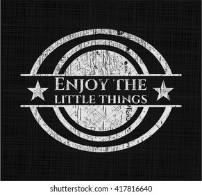 Enjoy the little things written on a blackboard