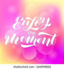 Enjoy the moment brush lettering. Vector stock illustration for clothing