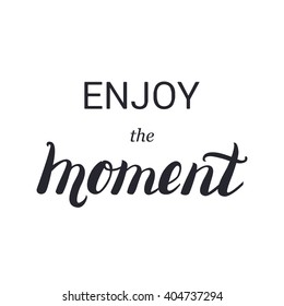 Enjoy the moment lettering calligraphy on brush strokes background. Inspirational quote. Motivational design for card, poster, shirt print. Unique typography. Vector art isolated on background. 
