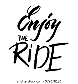 Enjoy the ride! Vector inspirational quote. Hand lettering, typographic element for your design. Can be printed on T-shirts, bags, posters, invitations, cards, phone cases, pillows.