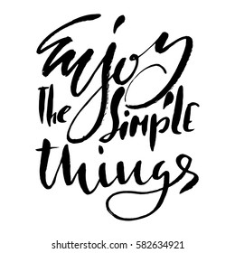 Enjoy the simple things. Hand drawn lettering. Vector typography design isolated on white background. Handwritten inscription.