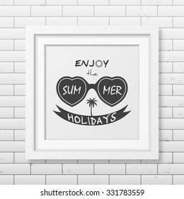 Enjoy the summer holidays - Typographical background in realistic square white frame on the brick wall background. Vector EPS10 illustration. 