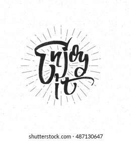Enjoy it . Trace written by pen brush for design. Positive phrase can be used as print, stamp, banner or label, your corporate identity