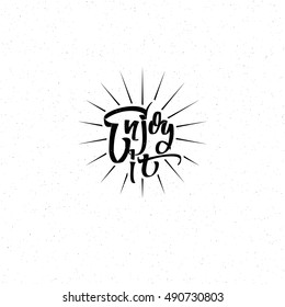 Enjoy it . Trace written by pen brush for design. Positive phrase can be used as print, stamp, banner or label, your corporate identity
