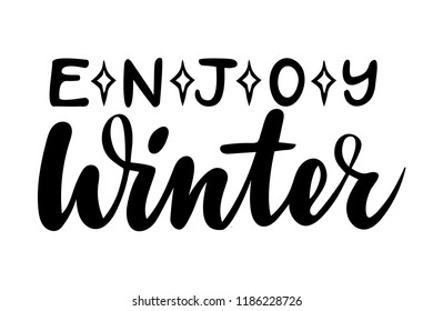 Enjoy winter. Isolated vector, calligraphic inspiring phrase. Hand calligraphy. Modern seasonal tourist design for logo, banners, emblems, prints, photo overlays, t shirts, posters, greeting card.