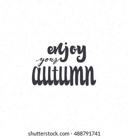 Enjoy your autumn . Trace written by pen brush . Positive phrase can be used as print, stamp, banner or label , for corporate identity