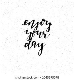 Enjoy your day. Hand drawn lettering black on white background. Stock vector