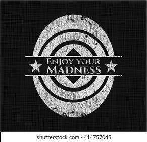 Enjoy your Madness written on a blackboard
