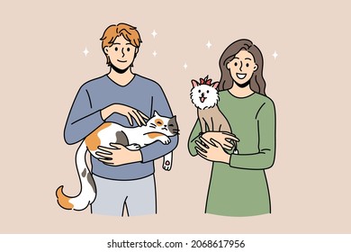 Enjoying Animals And Pets Concept. Young Smiling Couple Woman And Man Standing And Holding Cat And Small Dog On Hands Feeling Love Vector Illustration 