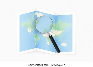 Enlarge Faroe Islands with a magnifying glass on a folded map of the world. Vector paper map.