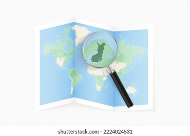 Enlarge Finland with a magnifying glass on a folded map of the world. Vector paper map.