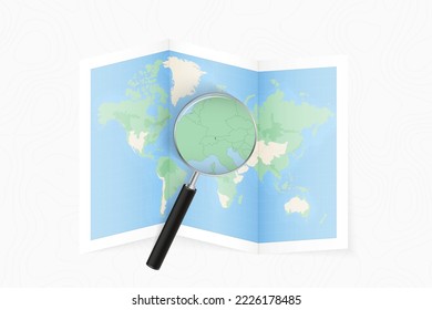 Enlarge Liechtenstein with a magnifying glass on a folded map of the world. Vector paper map.