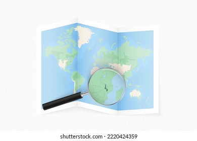 Enlarge Malawi with a magnifying glass on a folded map of the world. Vector paper map.