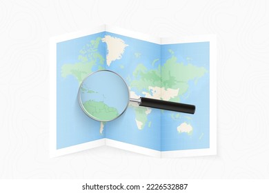 Enlarge Saint Vincent and the Grenadines with a magnifying glass on a folded map of the world. Vector paper map.