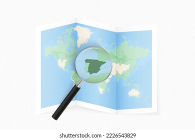 Enlarge Spain with a magnifying glass on a folded map of the world. Vector paper map.