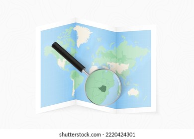 Enlarge Zimbabwe with a magnifying glass on a folded map of the world. Vector paper map.