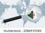 Enlarged map of Algeria on America centered World Map. Magnified map and flag of Algeria. Vector template.