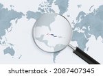 Enlarged map of Cuba on America centered World Map. Magnified map and flag of Cuba. Vector template.