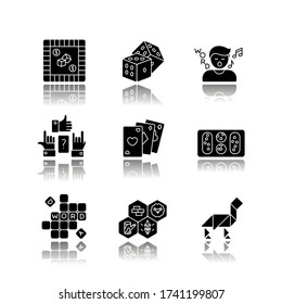 Entertaining games drop shadow black glyph icons set. Traditional fun activities for family recreation and friendly parties. Different board games. Isolated vector illustrations on white space