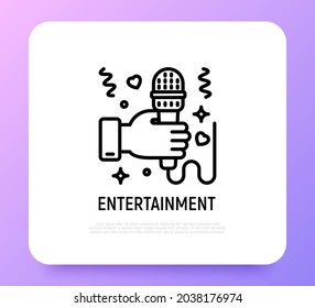 Entertainment: hand with microphone thin line icon. Karaoke, interview, singer symbol. Modern vector illustration.