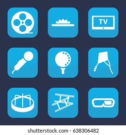 Entertainment icon. set of 9 filled entertainment icons such as child playground carousel, movie tape, camera tape, camera wheel, golf ball, kite, tv, microphone